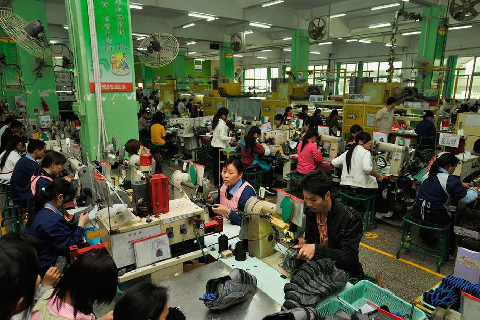 Zhao Meifang stitches uppers for New Balance shoes on the Freetrend factory assembly line.  She has worked there for four years and supports four children with her husband.Zhao left rural Chongqing in 1989.  She first went to Beijing, but moved to Shenzhen in 1992 where she has lived since. “In Sichuan,” she says, “there are no financial resources.”