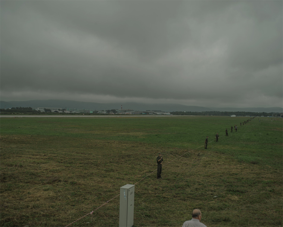Soldiers line up to patrol an airfield during a public event for the Sukhoi Aviation Company, a Russian government-controlled company, in Komsomolsk-on-Amur. The company, which produces both military and civilian aircraft, is the only major employer in the city, and almost half the city’s 250,000 residents work for it.
