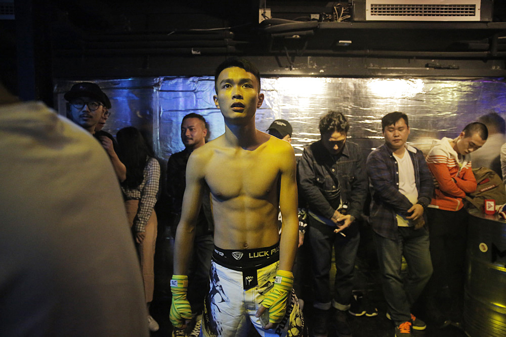 Bo gets ready before his fight with Xia. Their fight was the first of four that night.