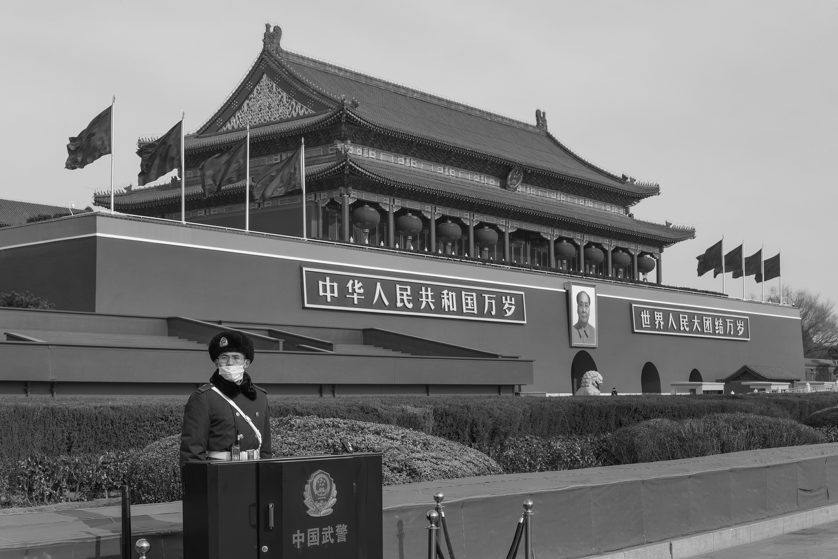 A People’s Armed Police officer stands guard outside the entrance to the Forbidden City, in Tiananmen Square, January 24, 2020.