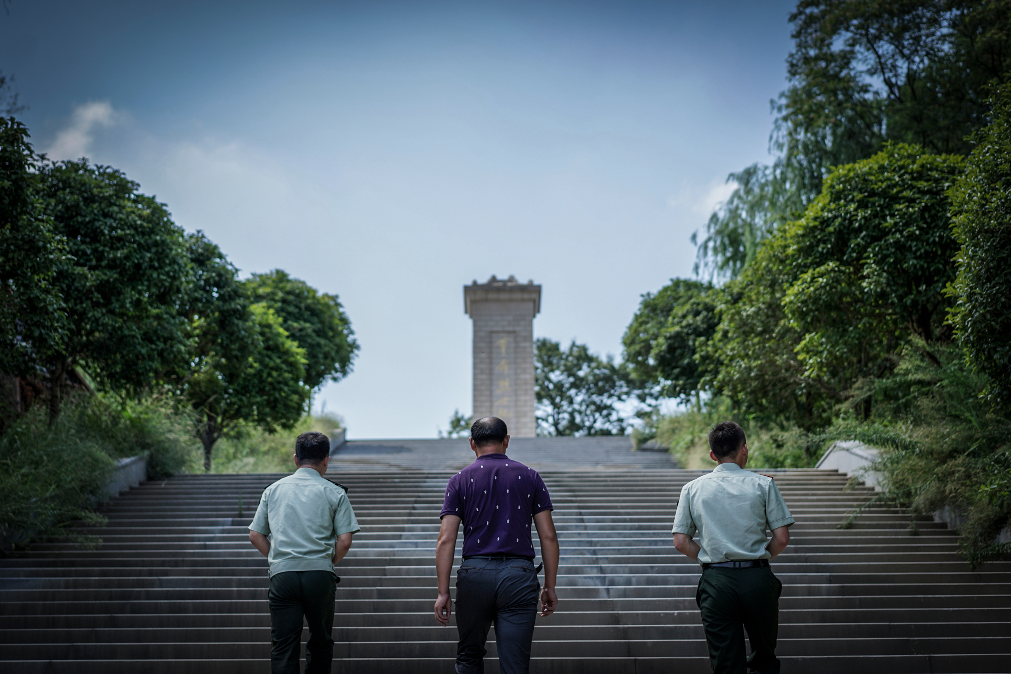Most of the people who died in the August 12, 2015 Tianjin explosion were firefighters like Pang Ti. On August 10, 2017, two days before the second anniversary of Ti’s death, his father, Pang Fangguo, and fellow firefighters visit his tomb at Martyrs’ Cemetery in his hometown, Suizhou, in Hubei province.