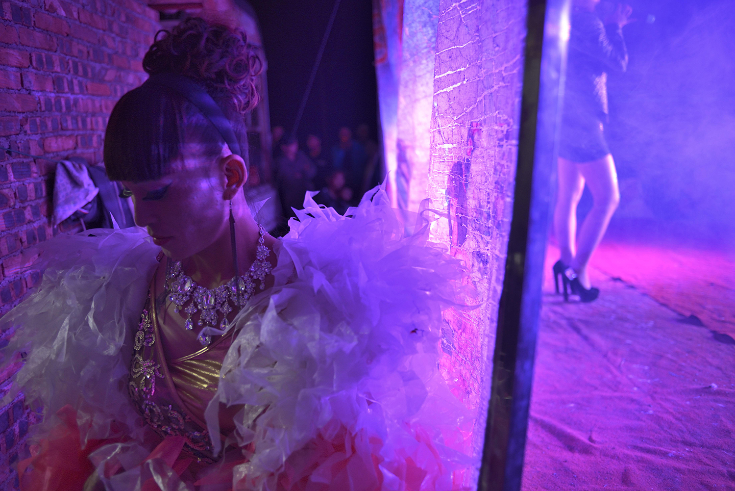 Liangzi waits backstage at a funeral performance, April 4, 2014. She says she enjoys the job not only because it allows her to express herself, but also because of her belief in Buddhism and Taoism.