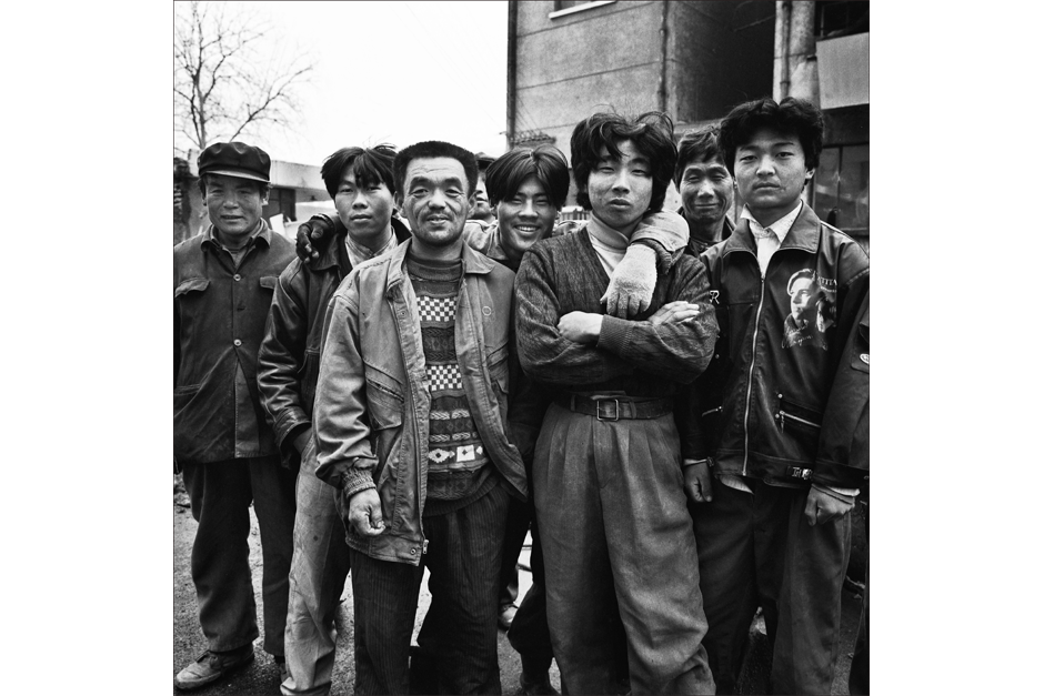 A group photo of factory workers.