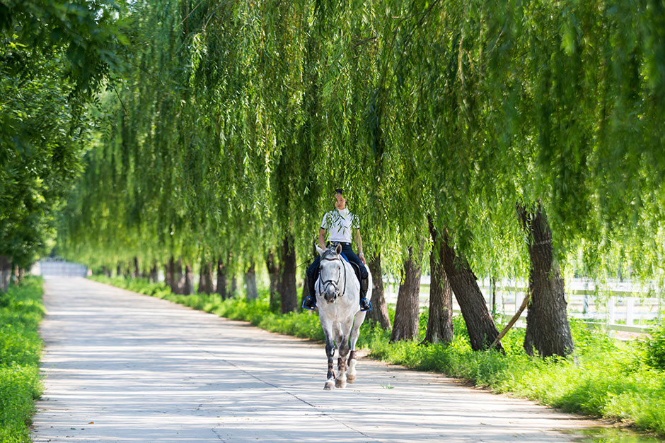 Yu “Vivi” Tian, 19, rides outside Beijing’s elite P.Y. Fulisilan Equestrian Club.