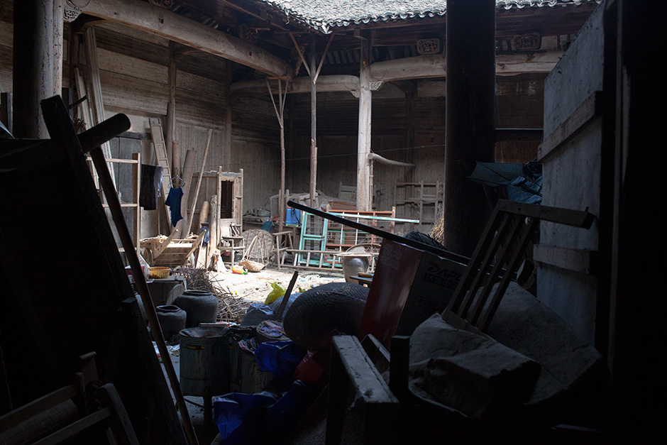 Fallen beams, window frames, and forgotten furniture obstruct the passage between the back room and inner courtyard of Mingxian Hall. “In my lifetime, people have never performed any rituals in ancestral halls in our village,” said Wang Shouchang. He says the last he heard of these customs was from elderly relatives during his childhood, six decades ago. In the nearby towns of Xidi and Hongcun, ancestral halls and other historic buildings are largely intact and UNESCO heritage status has brought a lucrative stream of domestic tourists.