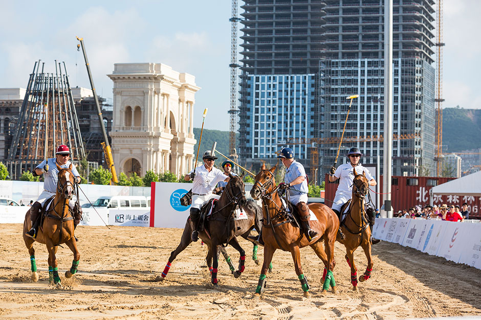 A match is underway at the “beach polo” event put on by SO! Dalian.