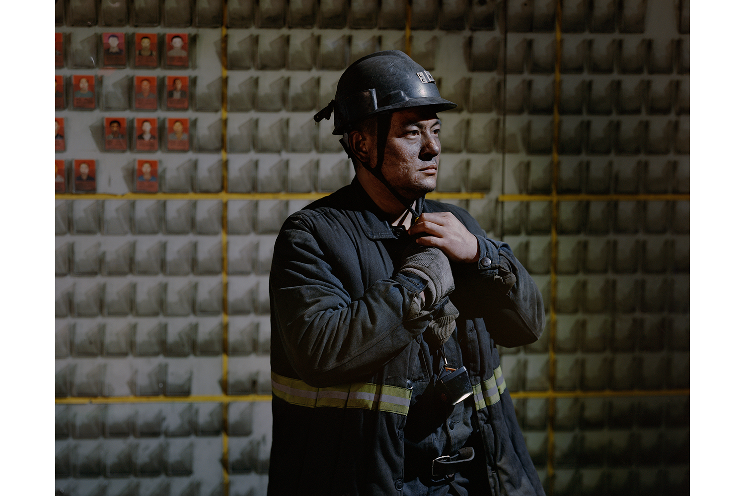 May 3, 31-year-old Yu Cunjiang takes off his safety helmet and gets ready for breakfast after working a 14-hour night shift in the Jinhuagong coal mine in Datong, Shanxi province. Shanxi, whose economy once relied heavily on its mineral resources, has shuttered 52 coal mines in the past two years in order to combat pollution, laying off thousands of workers in the process. (Li Junhui)