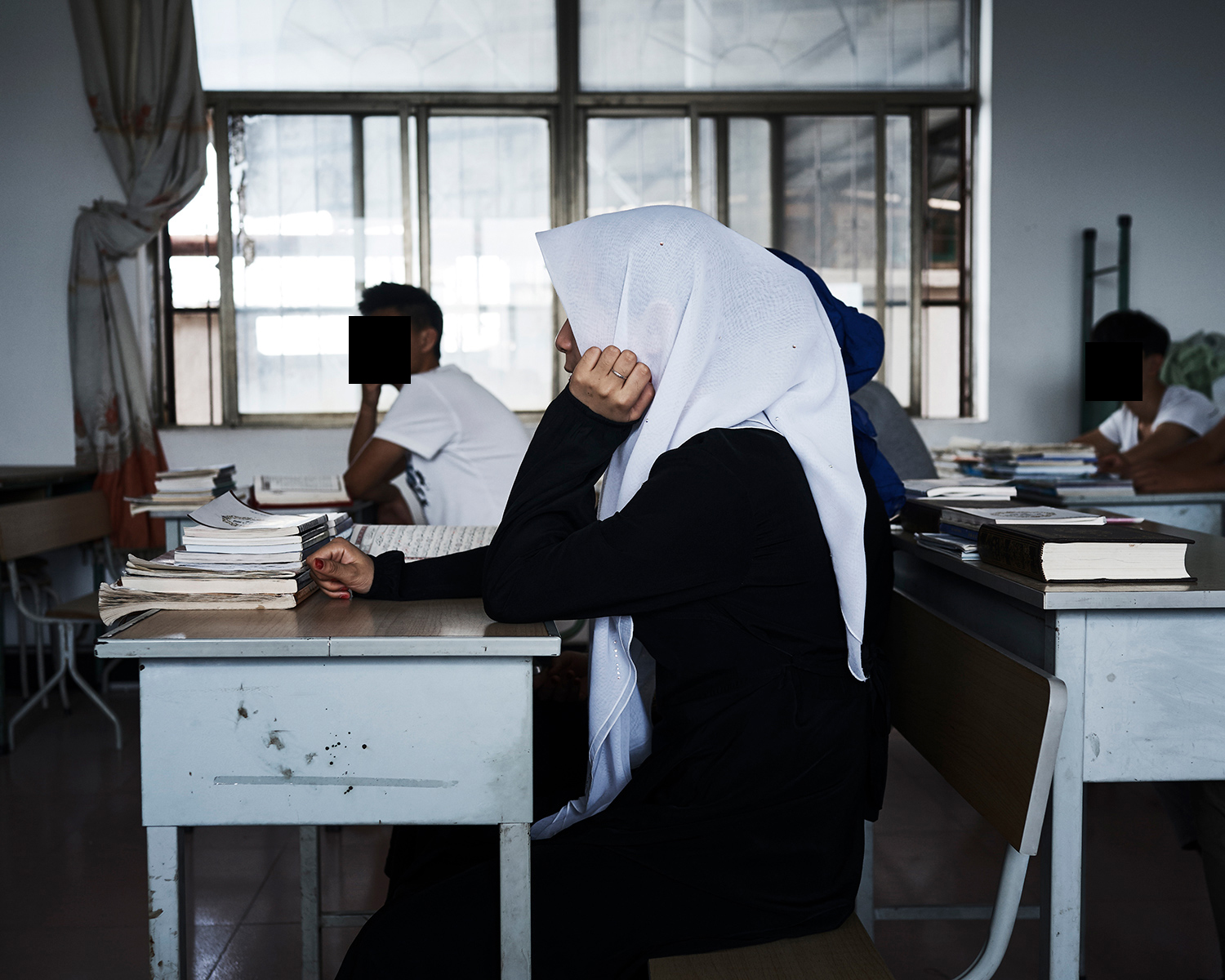 Students attend a class at the Arabic school in Nanguan Mosque, June 2016. 