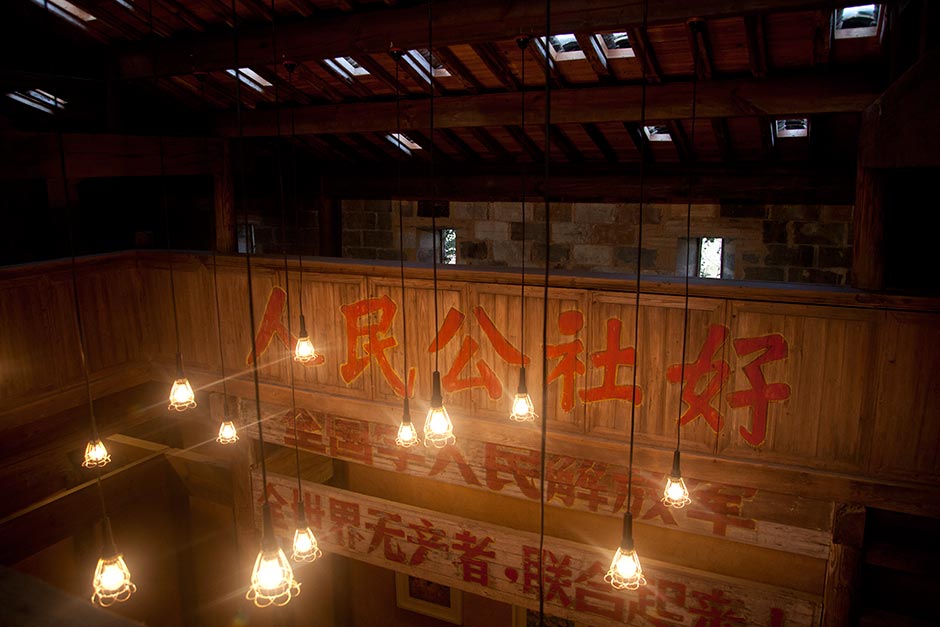 Another example of adaptive reuse, Pig’s Inn Number 3 (seen above) is the most recent of a successful trio of high-end inns in the Huizhou region. The first two in Xidi and Bishan are renovated traditional Huizhou-style homes that have fallen out of favor with the locals who prefer modern apartment-style living if they can afford it. This third inn is an erstwhile rapeseed oil factory on the outskirts of Bishan. It is not yet open to the public. The inns cater to an international clientele who eschew the region’s more popular modes of tourism.