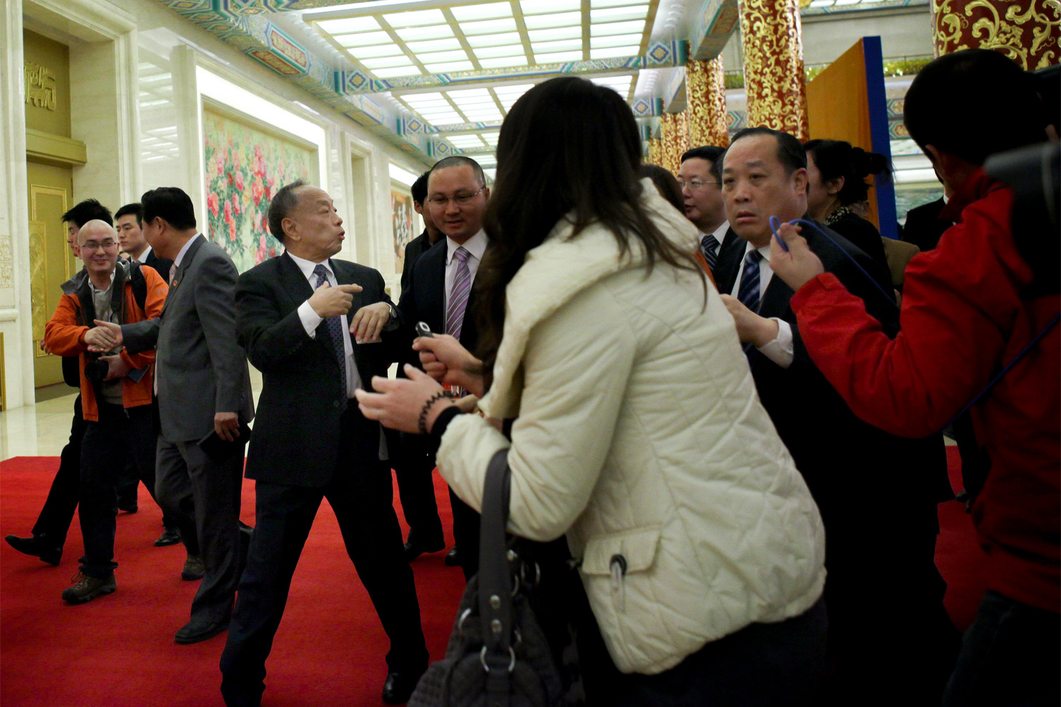 Li Zhaoxing, a spokesperson for the NPC, turns to answer questions from journalists after a press conference, March 4, 2011.