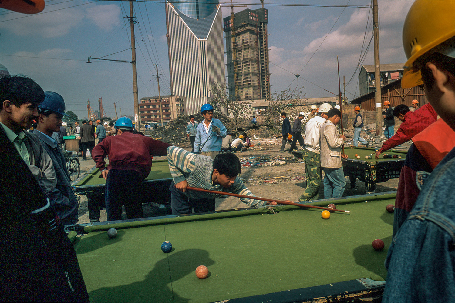 A village of construction workers takes root near the base of the Jin Mao Tower soon after construction began, 1997.