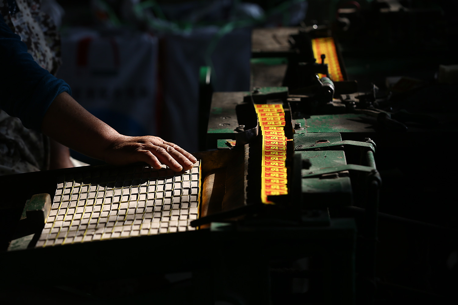 Working on the factory line.