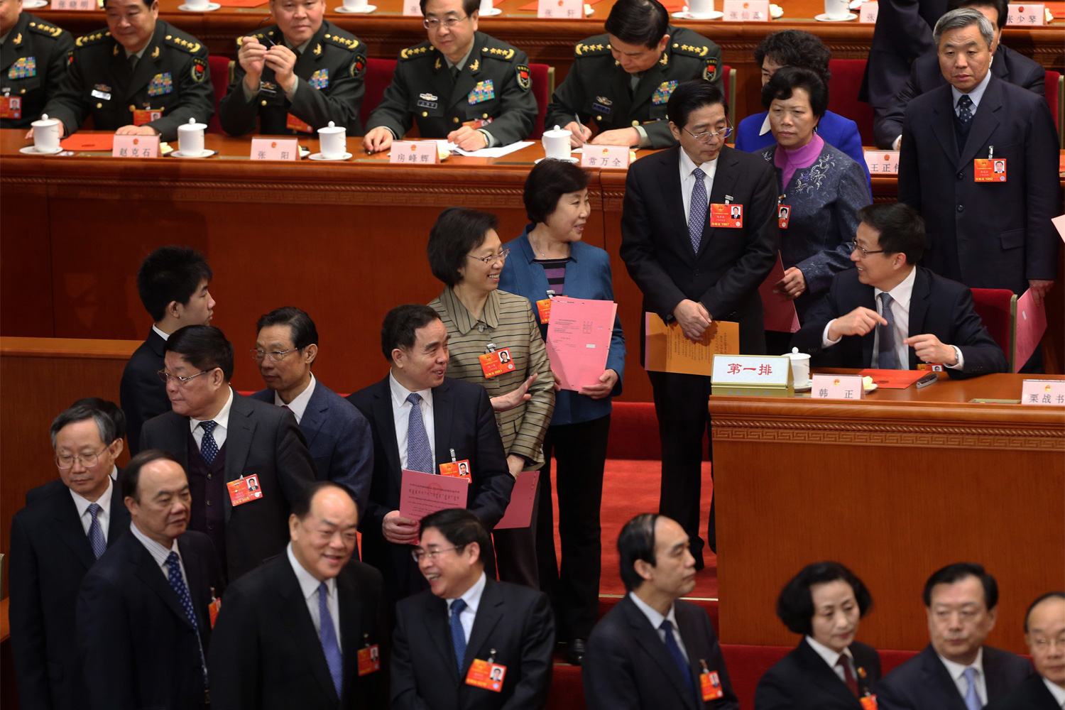 Deputies of the NPC queue up to vote whether to approve the nomination of Li Keqiang as the next Premier of China’s State Council during the Fifth Plenary Session of the First Session of the 12th NPC at the Great Hall of the People, March 15, 2013. The vote was open to the media. Li’s nomination was approved, making him the second most powerful official in China, directly behind Xi Jinping.