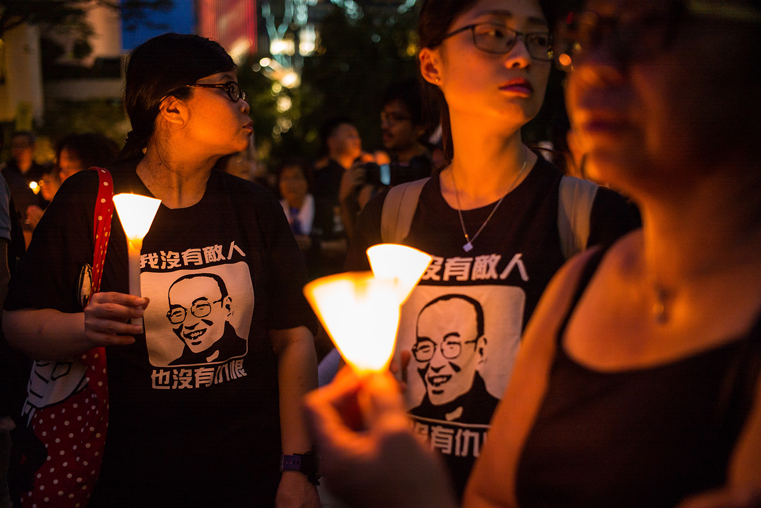 July 15, protesters carrying candles take part in a march to mourn the death of Nobel laureate Liu Xiaobo in Hong Kong. Liu, a literary theorist, poet, and longtime dissident who authored the pro-democracy manifesto “Charter 08,” died on July 13 from complications of liver cancer while serving an 11-year prison sentence for “incitement to subvert state power.” He was 61. (Billy H.C. Kwok/Getty Images) 