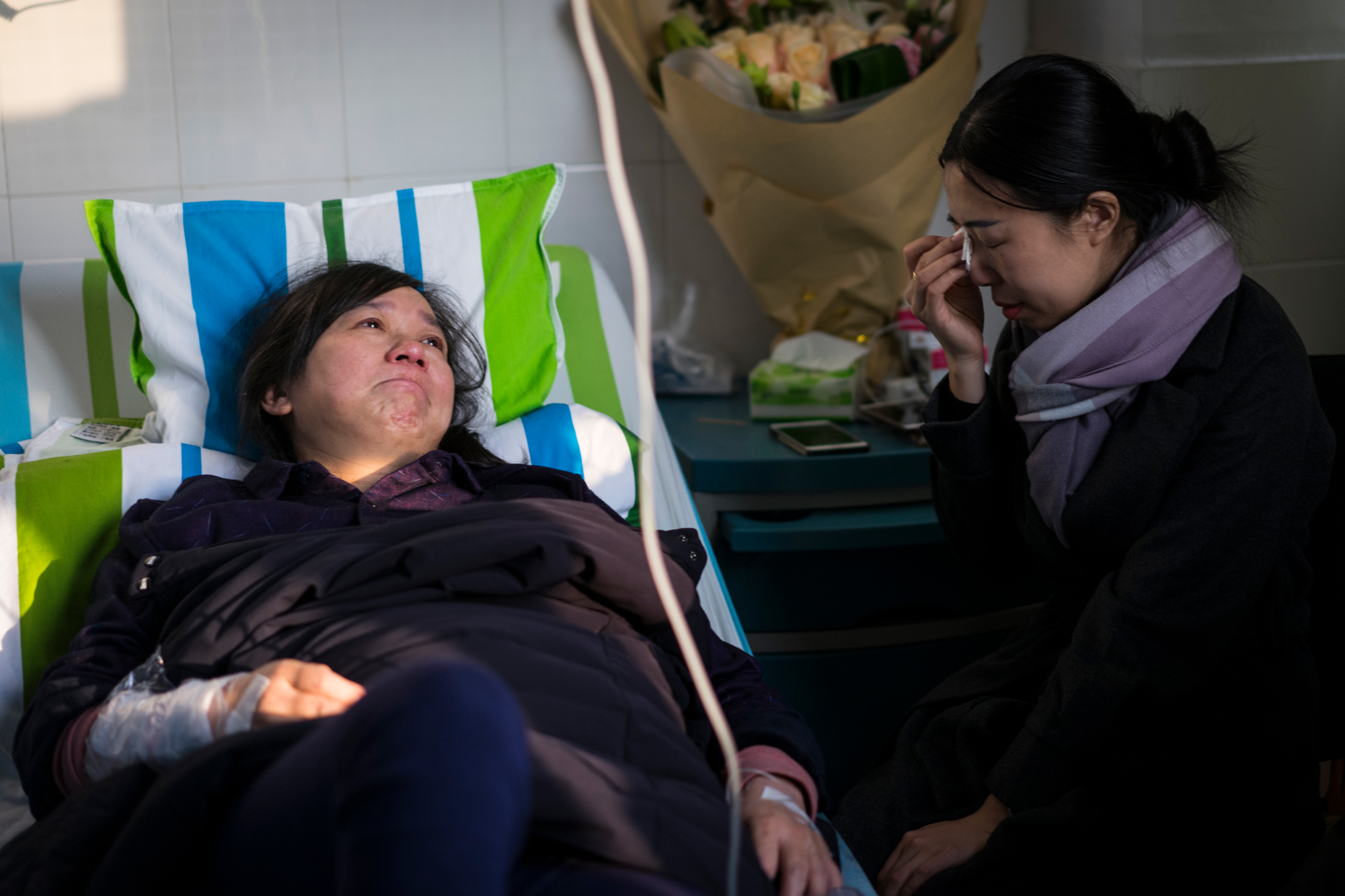 Ti’s former colleague flew from Tianjin to Wuhan to visit, December 17, 2017. The mixture of happiness and yearning for Ti makes Zhiying burst into tears.