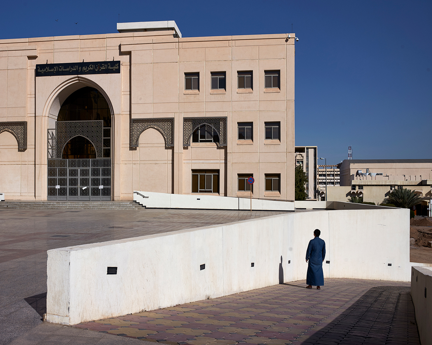 Mohammed, a Hui student born in 1989, takes a walk in Medina, Saudi Arabia, January 2018. He is also from Linxia. Due to his excellent academic record, Mohammed was admitted to the Islamic University of Madinah in Medina. He says the school offers generous benefits, including waiving tuition, providing a stipend, and reimbursing his flights to and from China. 