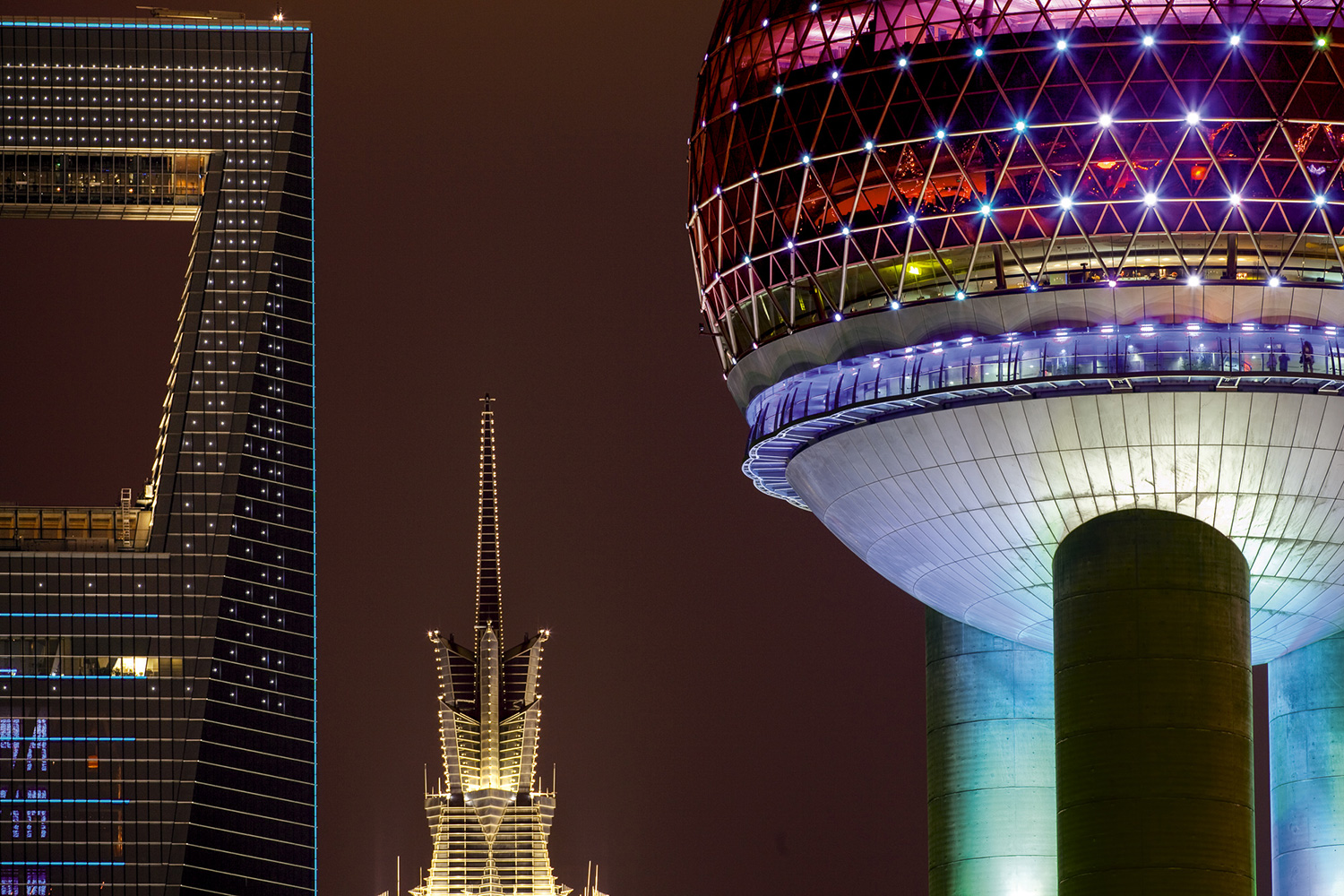 Three generations of architecture—the oldest, the Oriental Pearl Radio & TV Tower, right; the Jin Mao Tower, center; and the Shanghai World Financial Center—have become signature buildings in Shanghai’s skyline, 2010.