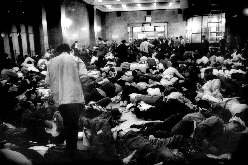 Migrants sleep in the Beijing Train Station. Although numbers fluctuate with the swings of the global economy, over 100 million people are believed to make up China’s “floating population.” 