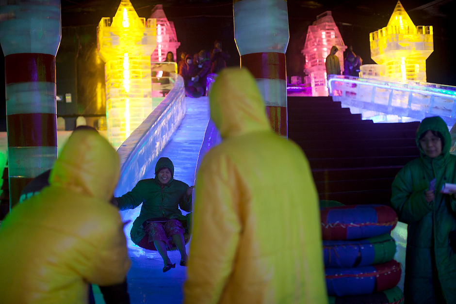Spirits are bright at an ice park built by a Chinese company in Yangon. Natives of the tropical city found it a novelty to wear borrowed down jackets as they trudged around on the ice in their open-toed sandals. The ice park is but one of a recent influx of Chinese businesses in Myanmar. But the current government, which put a massive Chinese-backed dam project on hold, seems to be signaling a shift away from a reliance on the Chinese to greater openness towards the U.S. 