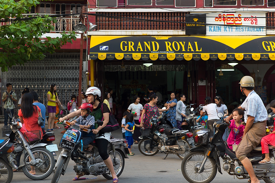 Chinese parents pick up their children outside a Chinese restaurant in downtown Mandalay. While ethnic Chinese have resided in Myanmar for several generations, the growing number of Chinese coming to the country over the past decade has caused disquiet and anti-Chinese sentiment among Burmese.