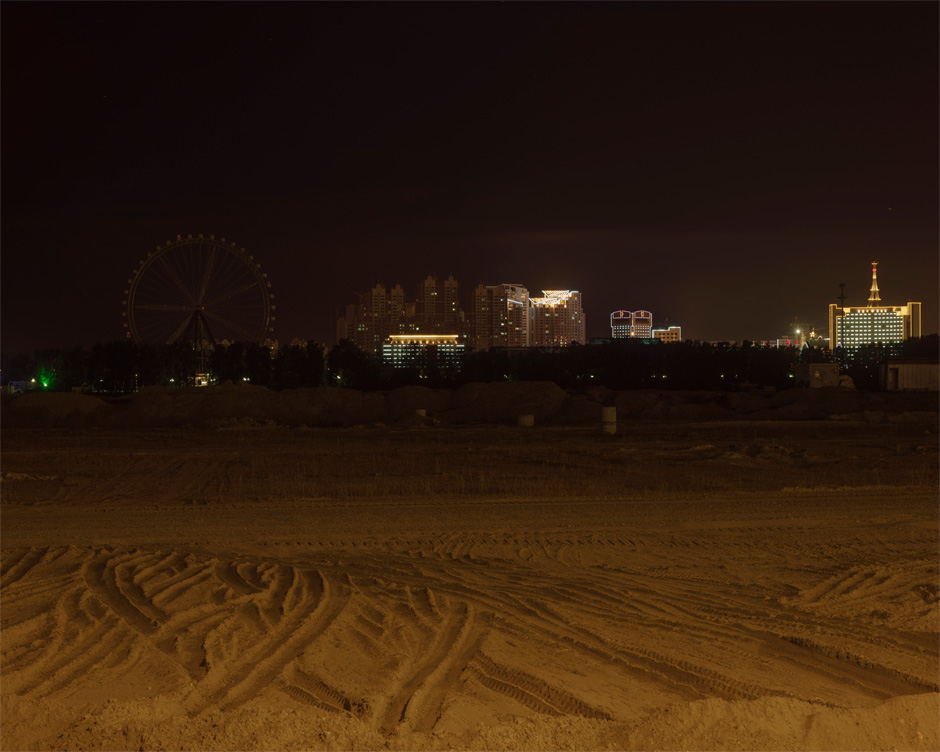 From across the Amur River in Blagoveshchensk, Russia, the Chinese city of Heihe glows in the night.