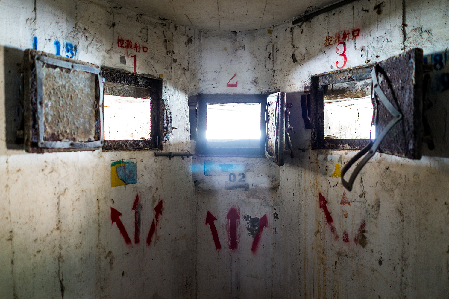 Windows in the coastal L18 military bunker and fort on Lieyu Island, through which soldiers would have watched the coast and fired their rifles, show the signs of age and disuse. This place is at the heart of a dispute between civil society activists and local authorities who have drawn up plans to redevelop the location into a tourist spot celebrating Little Kinmen’s specialty product, the yam. Local activists say redeveloping the bunker would destroy its authenticity and grit. Activists and local military historians have been researching the military installations littered all over Kinmen and have, with some success, protested several government plans to develop areas for tourism, on grounds that it would destroy historical heritage, wildlife, or the environment.