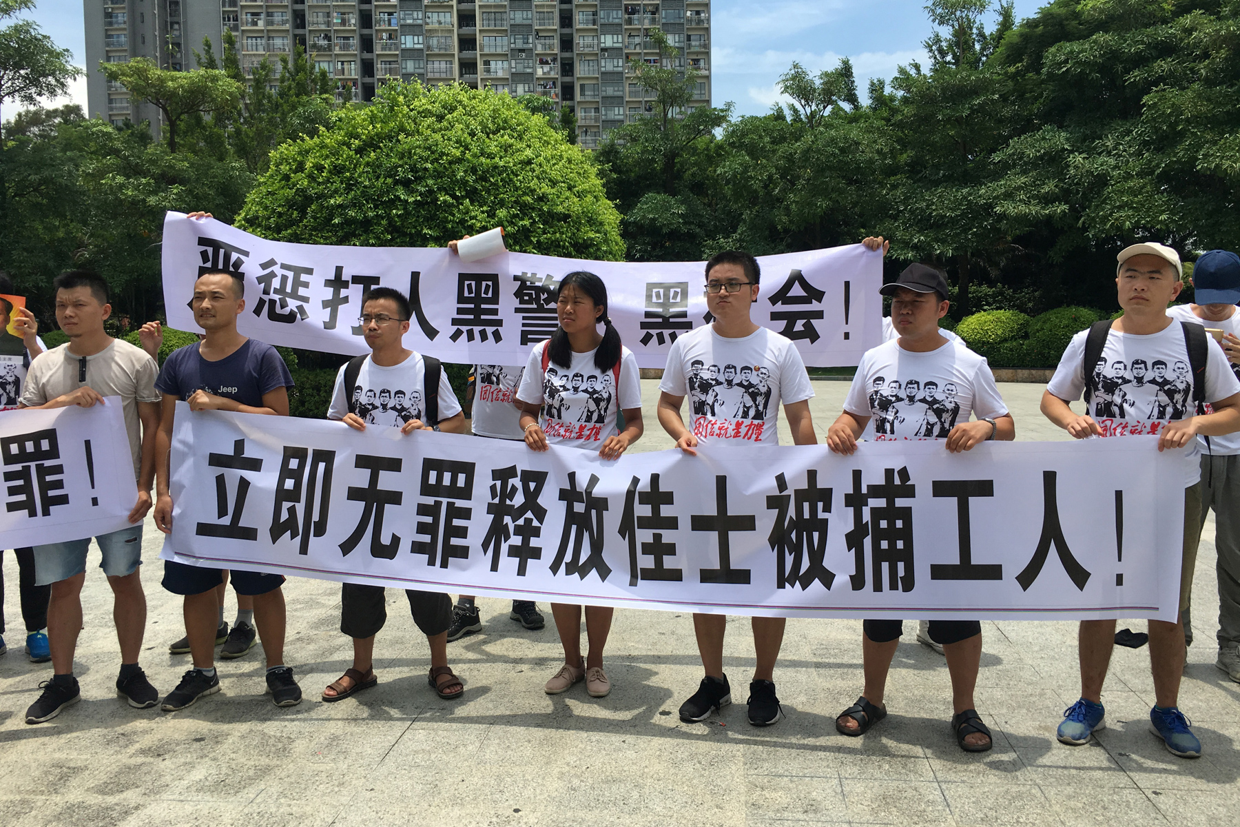 Student activists hold banners at a protest in support of Jasic Technology workers’ efforts to unionize, Shenzhen, Guangdong province, August 6. At least 10 protesters were detained across several cities, including students from top universities, as part of a wider government crackdown on student activism on behalf of workers. (Sue-Lin Wong/Reuters)