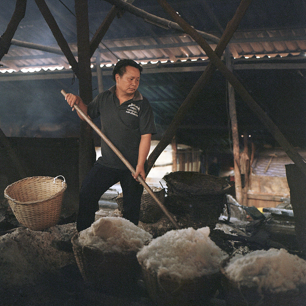 Singthong Saomany moved from a nearby province in Laos in 2005 to work in a salt factory in Boten, April 12, 2019.