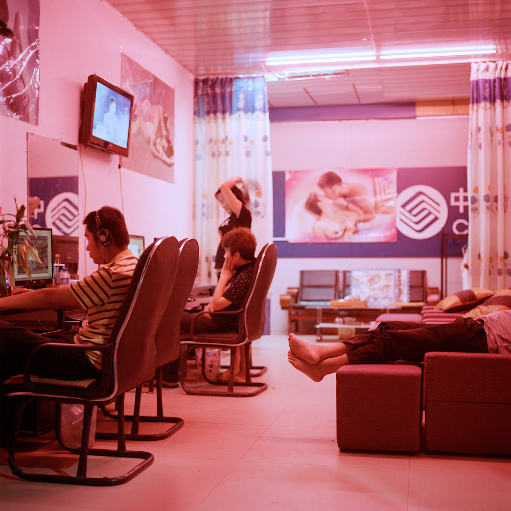 Boten residents visit an Internet cafe that doubles as a massage parlor, January 2016.