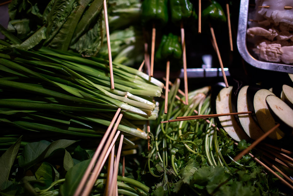 <em>Shaokao</em> ingredients prepared on skewers for diners near Shibati.