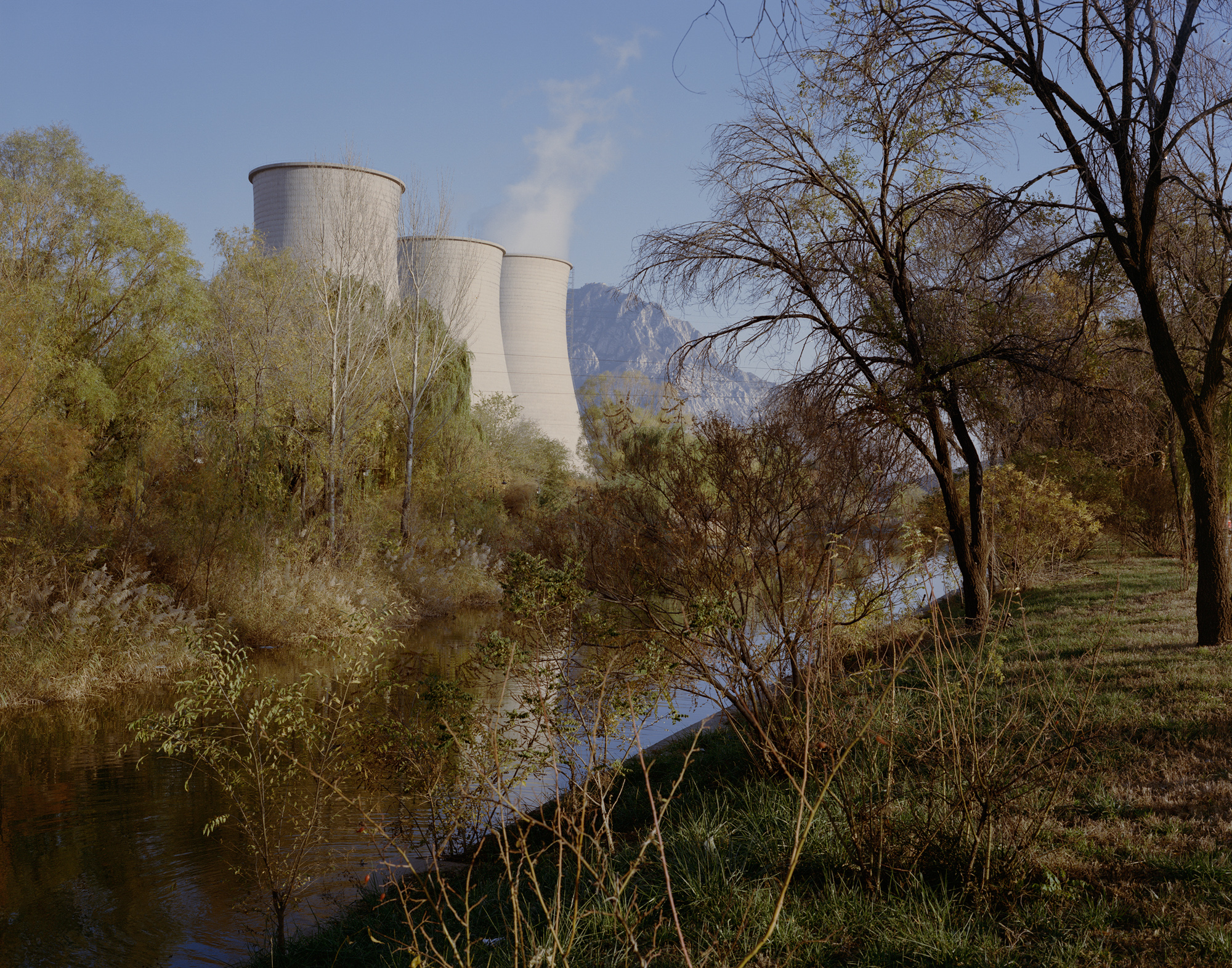 At Xiahuayuan Power Plant, only one of three cooling towers still functions, in the city of Zhangjiakou, Hebei province, October 2017. The Xiahuayuan district of Zhangjiakou, once abundant in coal, is also on the 2013 “resource-based cities” list, identified as “declining.”