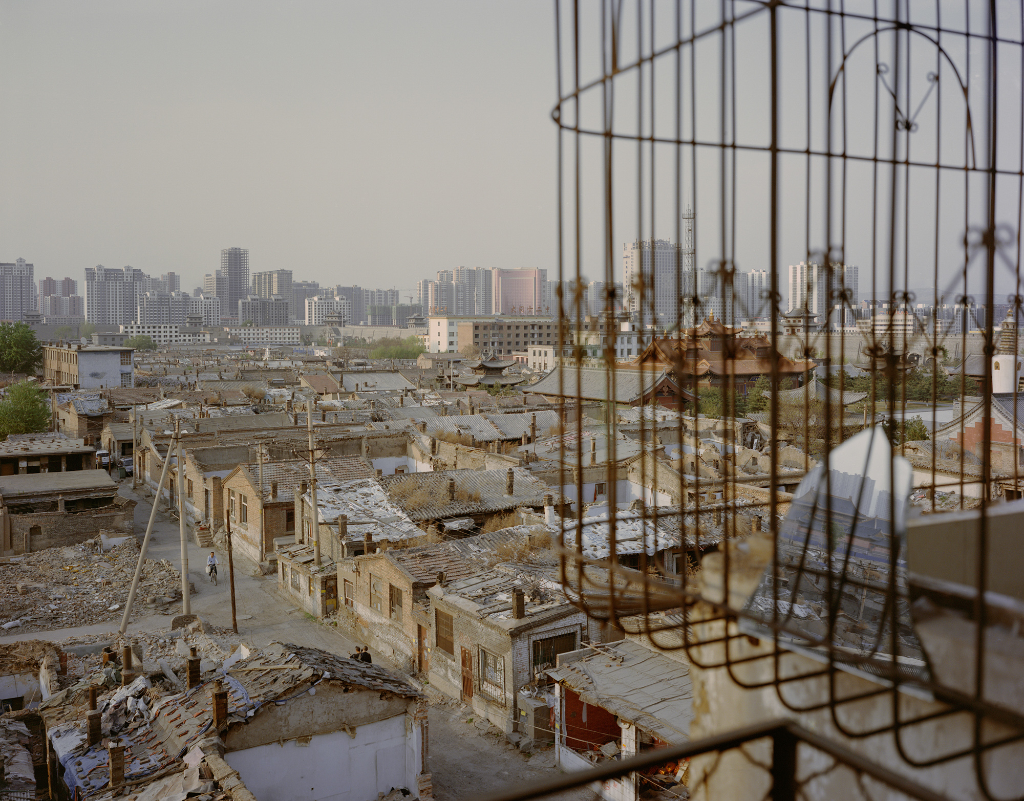 The old town area of Datong city, labelled China’s “coal capital,” in northern Shanxi province, May 2017. The government designates Datong a “mature” resource-based city, a city in which “resource extraction is stable, and resource preservation is effective.” To give the city a future not heavily reliant on coal, former Mayor Geng Yanbo sought to develop the tourism industry by recreating the “ancient city”––ordering the demolition of modern architecture and relocating nearly half a million residents.