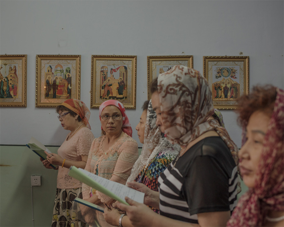 Russian Orthodox in Harbin attend Sunday prayers in a private apartment not far from the Church of the Protection of the Mother of God, officially closed for renovation. The Chinese government does not recognize Orthodox Christianity as an official religion, but in October 2015 the Russian Orthodox Church ordained former banker Yu “Aleksandr” Shi, of Harbin, its first Chinese priest to be ordained in 60 years.