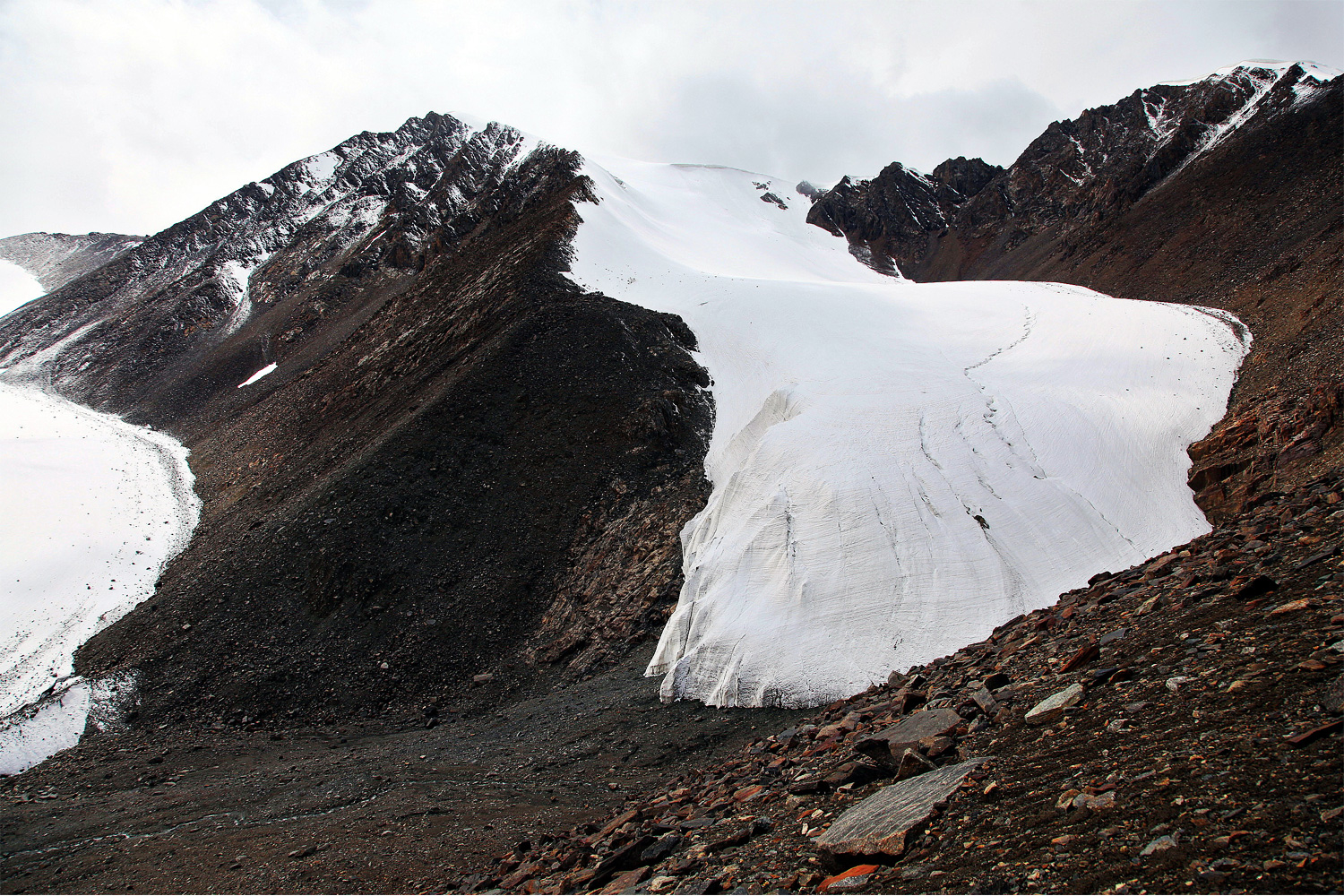 The retreating Tian Shan No. 1 Glacier has split in two. The glacier is a major source of water for the provincial capital of Urumqi. Photo by Yang Yong.