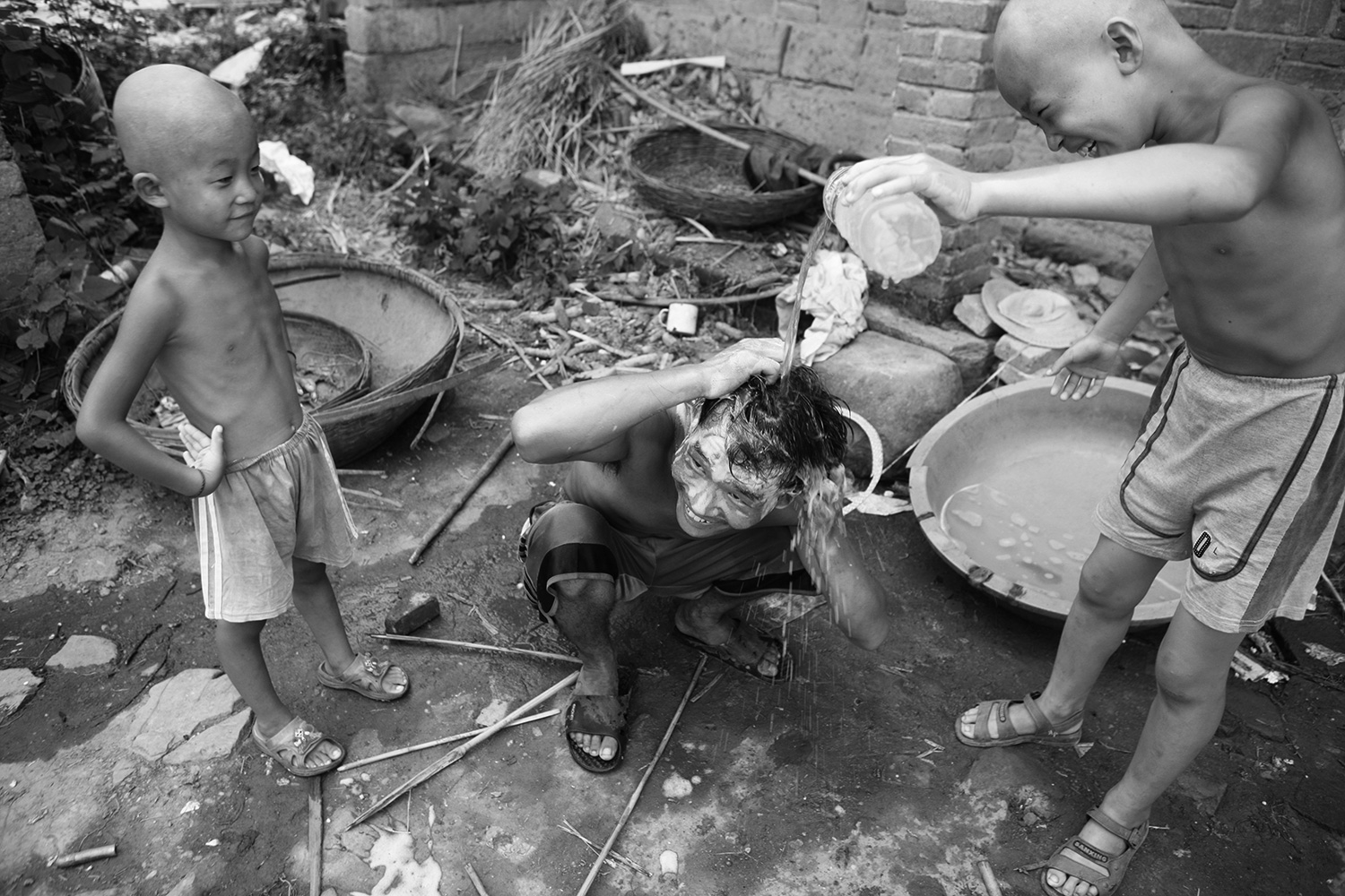 Children bathe before departing.