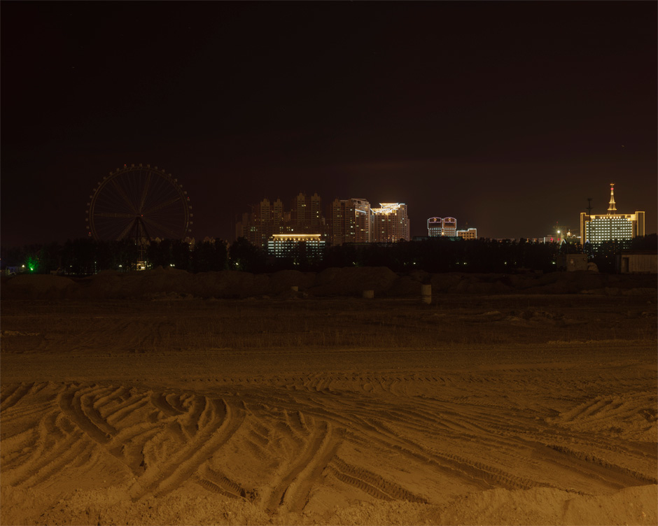 From across the Amur River in Blagoveshchensk, Russia, the Chinese city of Heihe glows in the night.