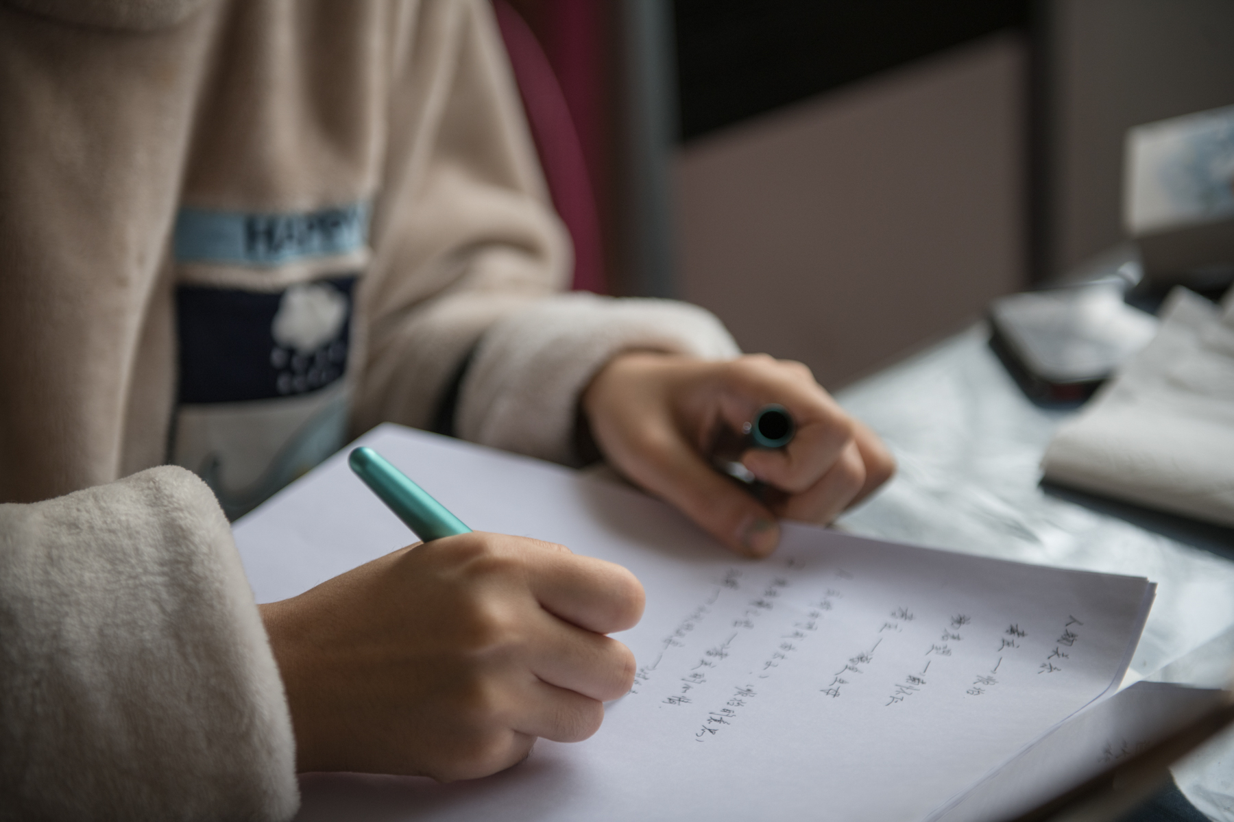Zhou writes a script at home, November 28. She says she tries to not let her case influence her work too much.