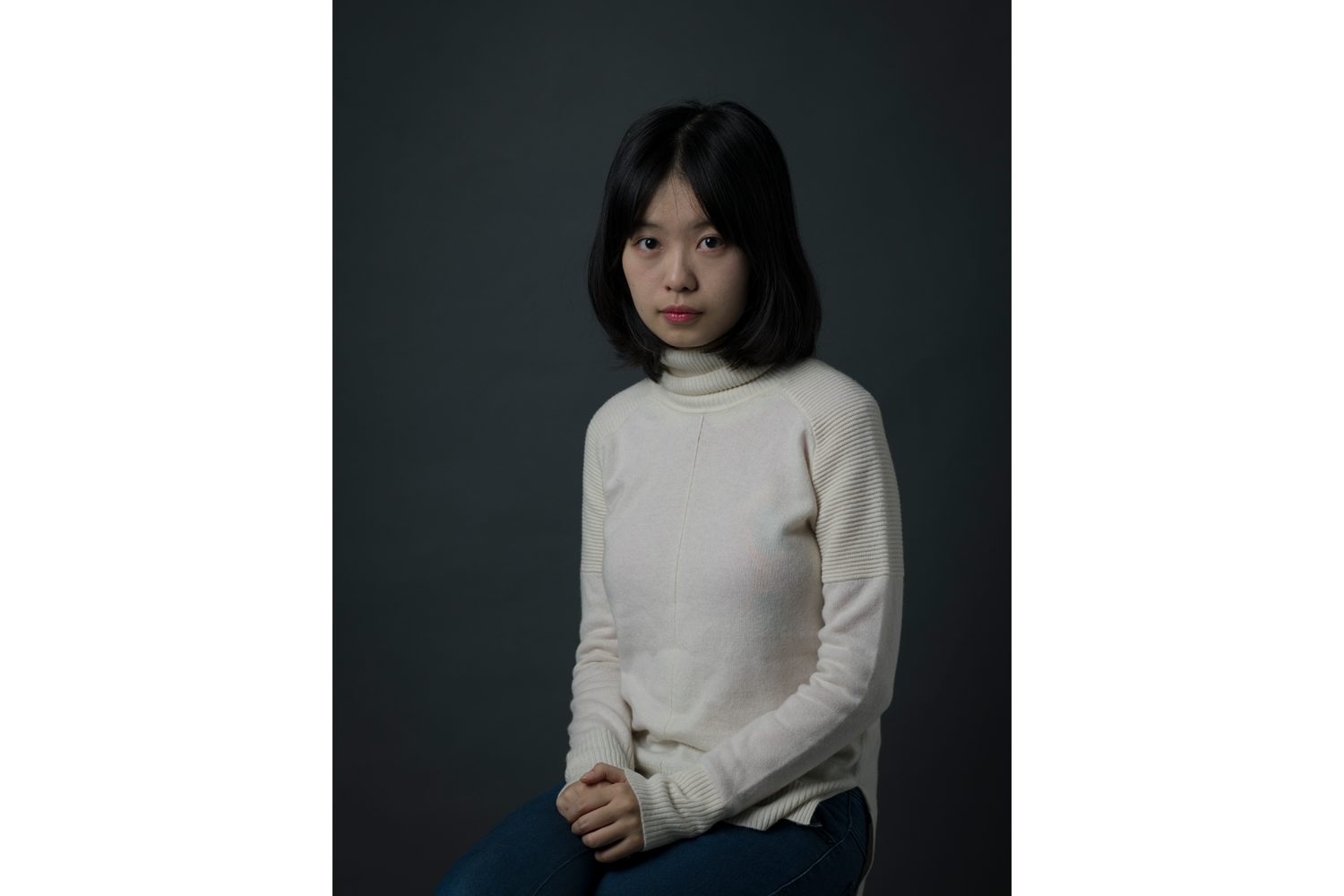 Zhou, 25, poses for a portrait, in Beijing, December 9. On September 25, while she was at one court filing a claim against Zhu for infringement of her right to personal dignity, Zhou received official notification from another court that Zhu had sued her for defamation. Also named in the defamation suit was Xu Chao, a friend of a friend, who had first posted Zhou’s accusation on the social media platform Weibo.