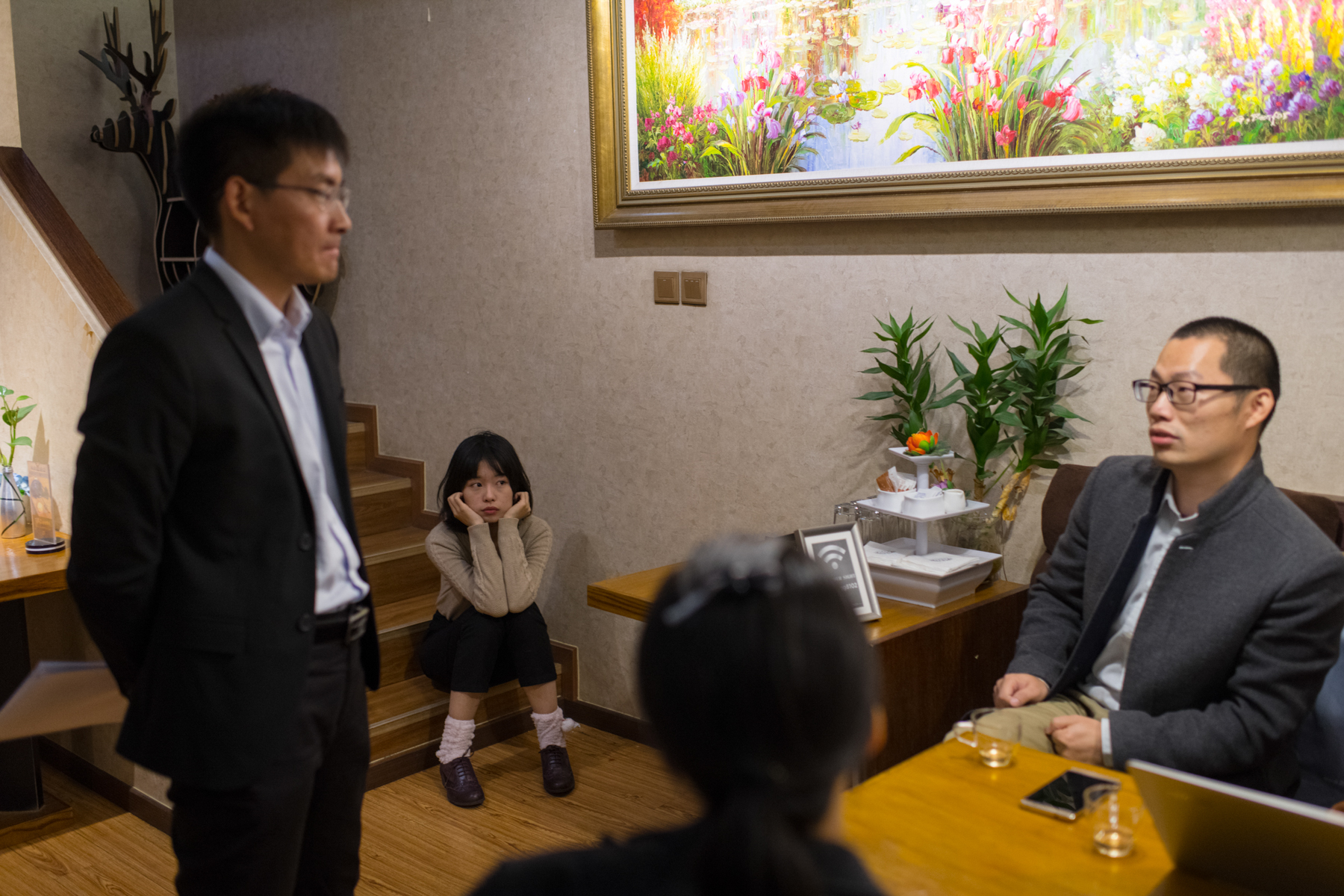 Zhou, Xu (not pictured), and their lawyers meet at a cafe before a pretrial evidence exchange for the claim Zhu filed against them, October 25. The team expects both cases (the one Zhu filed against Zhou and Xu, and the one Zhou filed against Zhu) will take a long time to resolve. Zhou says, “If we win, more women would feel encouraged to stand up and defend themselves.” 